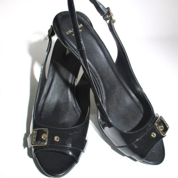 Black kitten heels decorated with a buckle strap