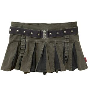 green denim mini skirt decorated with a black studded belt and straps