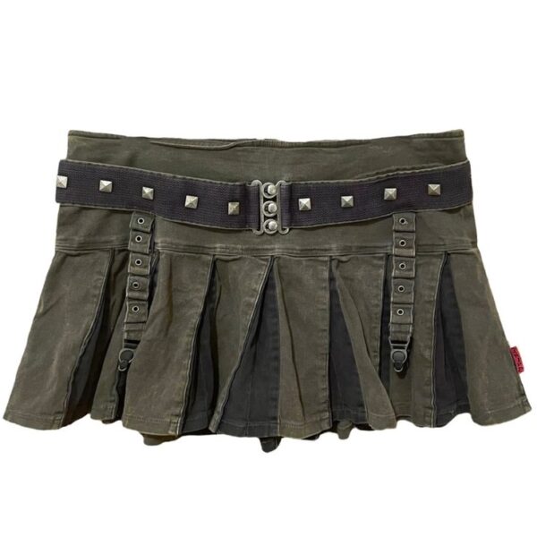 green denim mini skirt decorated with a black studded belt and straps